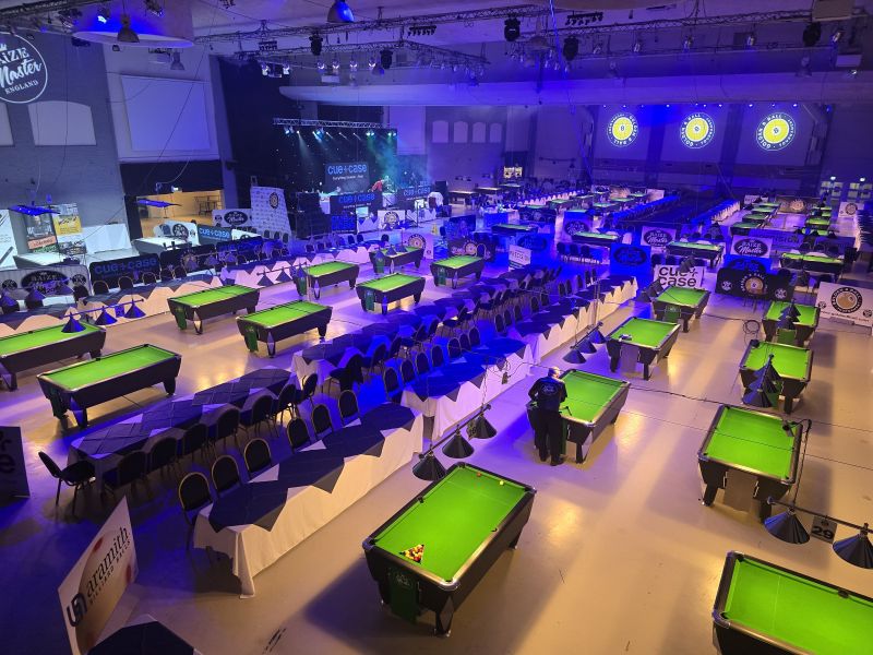 The 2025 arena set up with 42 tables and sponsor boards